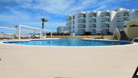 Coastal Apartment for Sale in Port Des Torrent with Sea Views and Shared Pool
